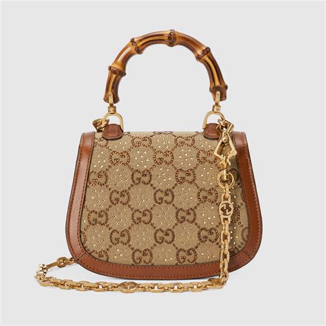 gucci 1947 bamboo top handle bag|Gucci monogram bamboo handle bag.